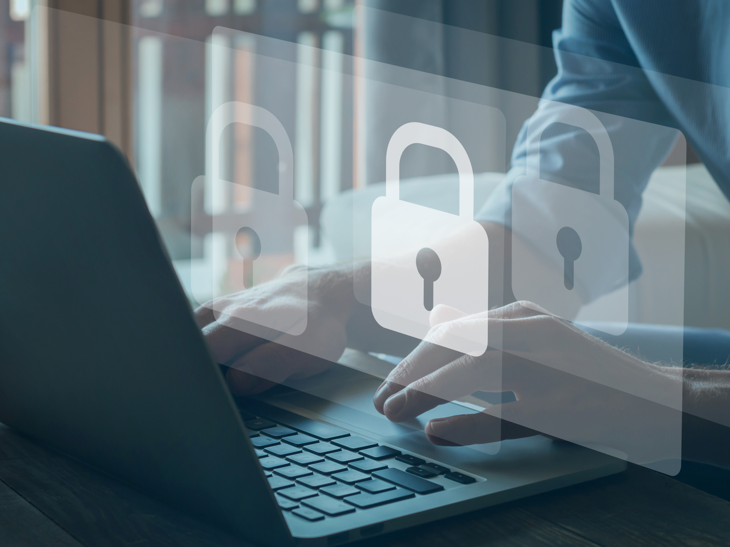 A laptop displaying padlock icons, representing online security and protecting personal information.